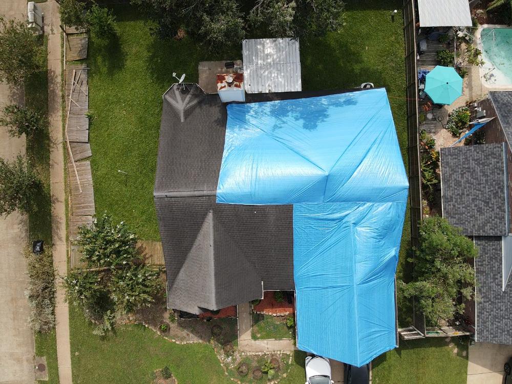 Emergency roof tarping for asset protection